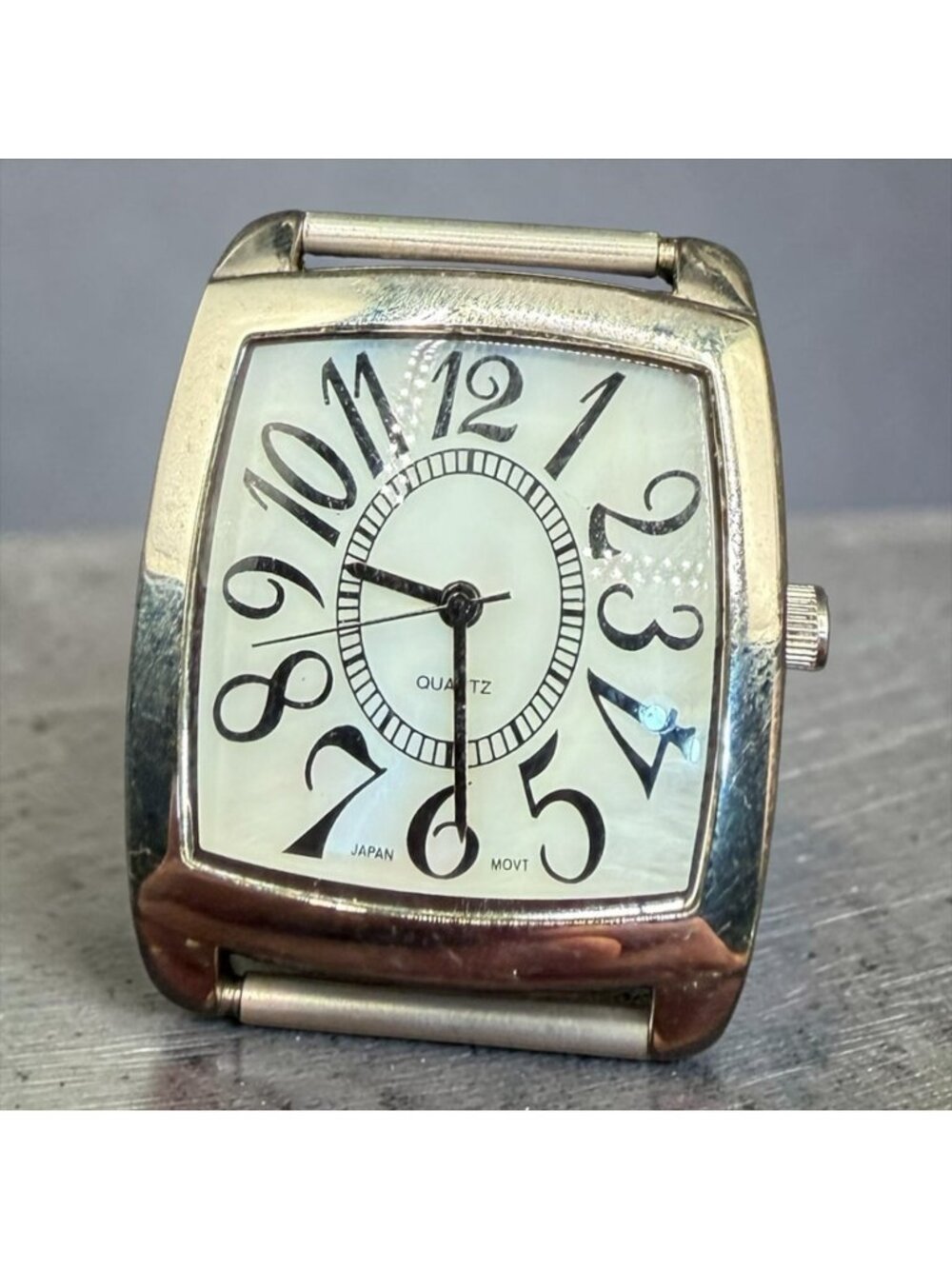 Silver-Tone Square Quartz Watch Face Distorted Numerals & Stainless Steel Back